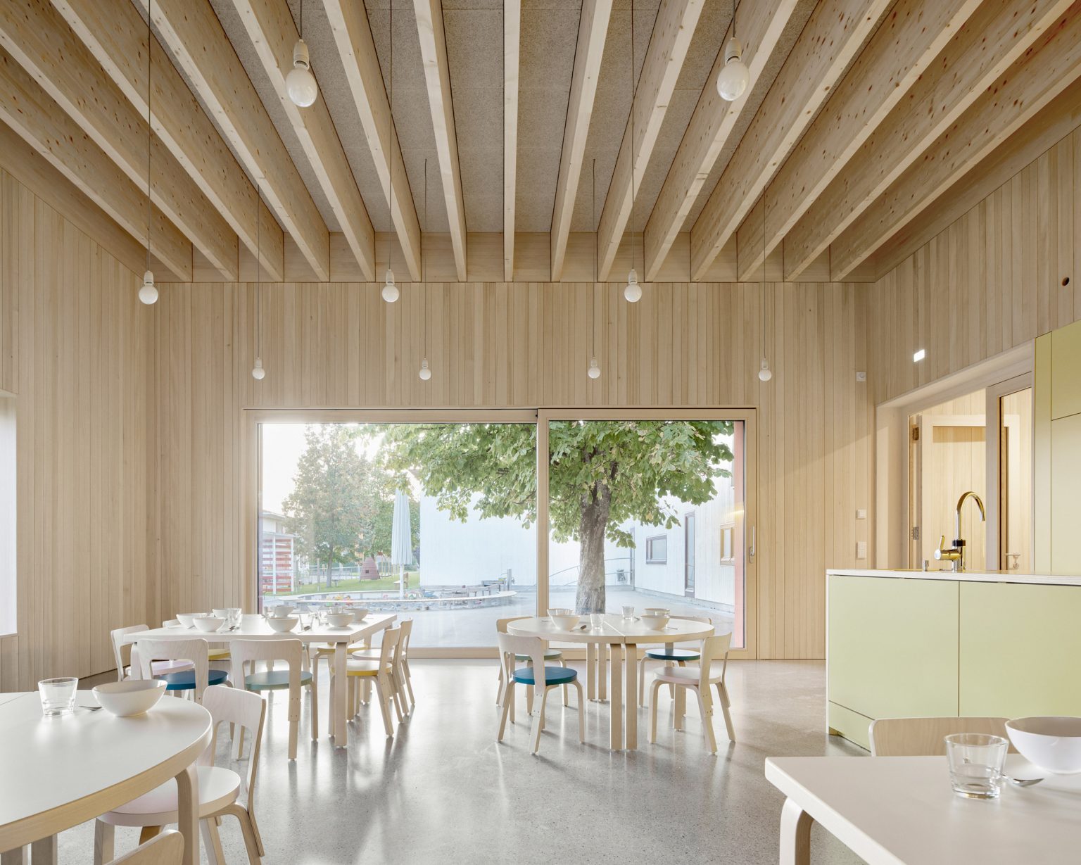 news: bernardo baderr adds timber extension on kindergarten am schlatt ...