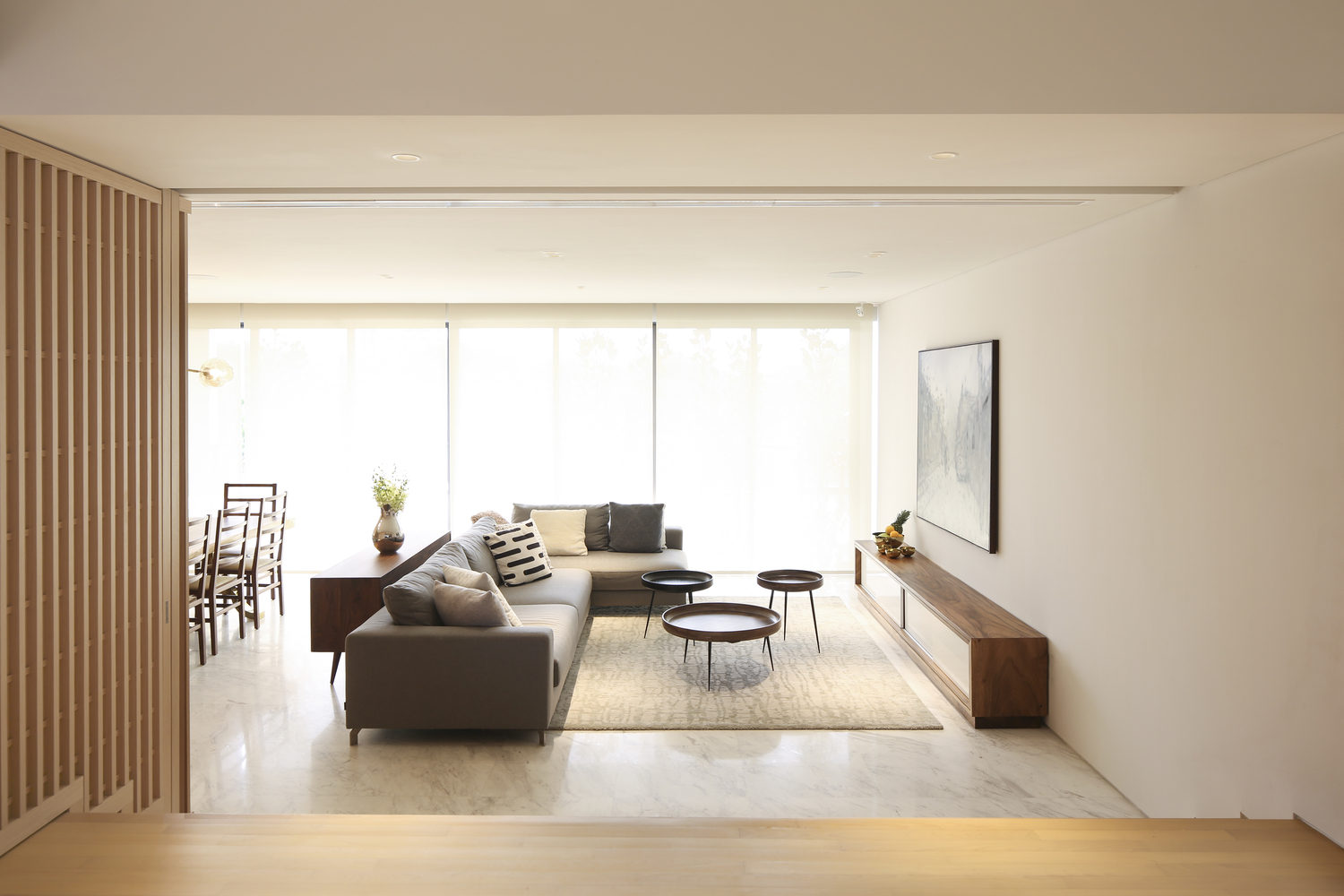 a simple, neutral, and warm home for a growing family in singapore ...