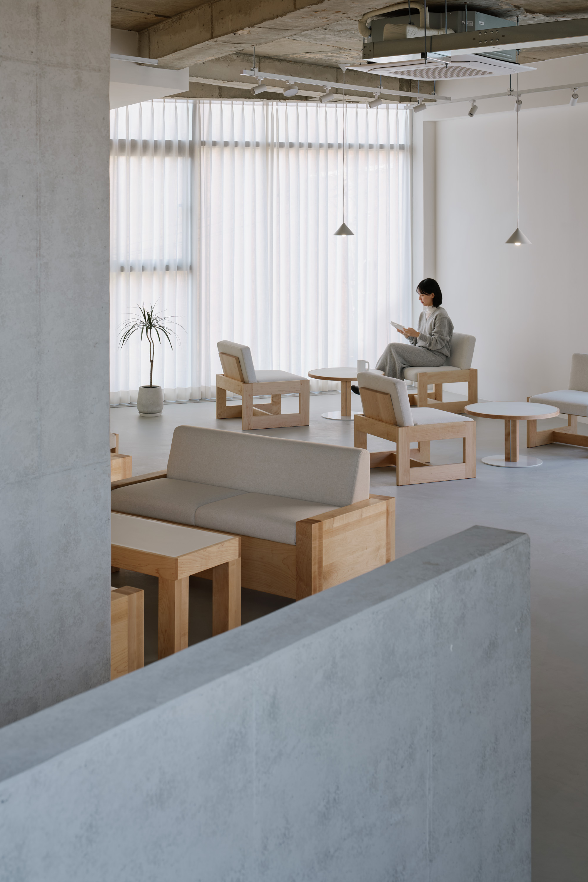 news: kkol studio infuses scandinavian minimalism into korean ozbe cafe ...