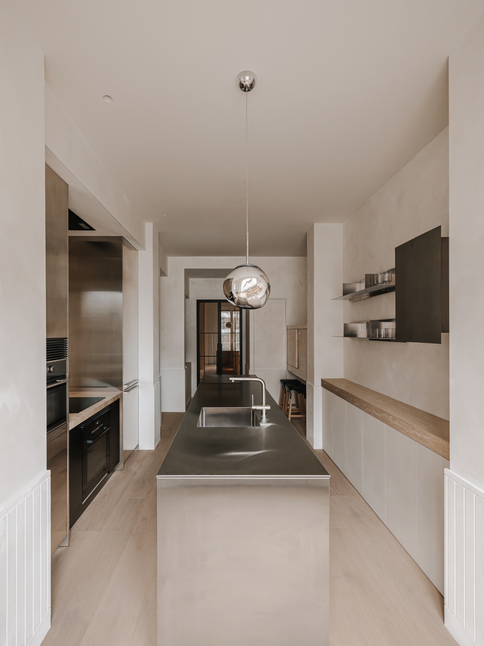 steel surfaces and mediterranean hues define renovated barcelona ...