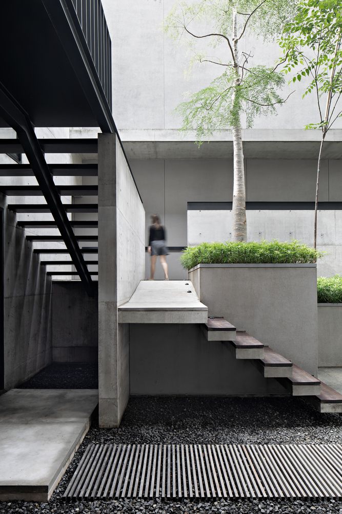 hideout house celebrates indoor-outdoor connection around a shallow ...