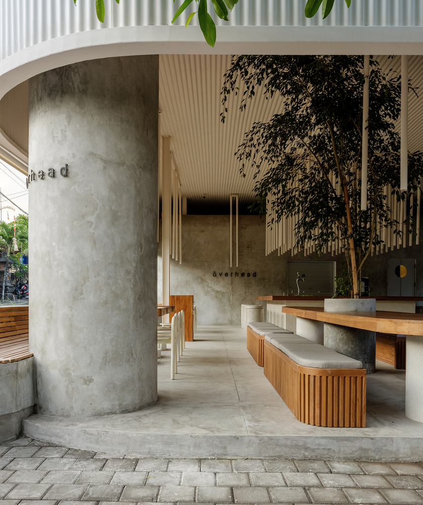 overhead restaurant promotes indoor-outdoor connection with wallless ...