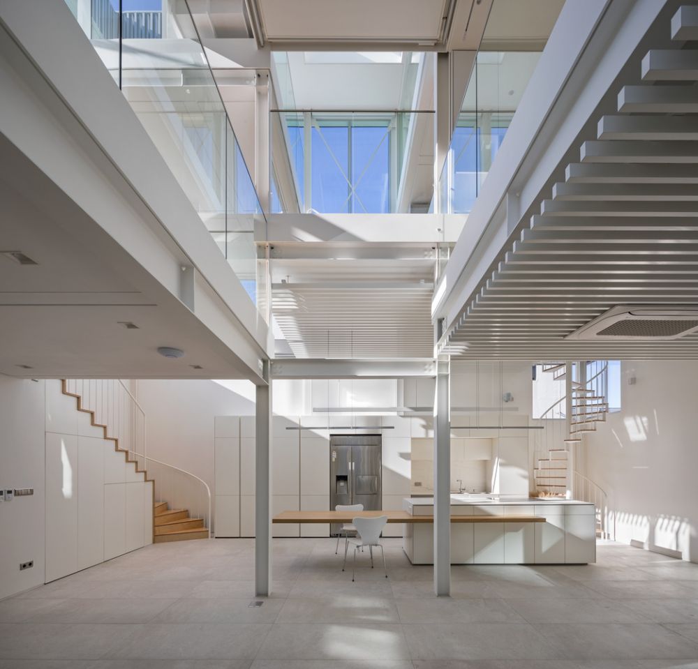 light hollow is a tranquil house that brings in abundant natural light ...