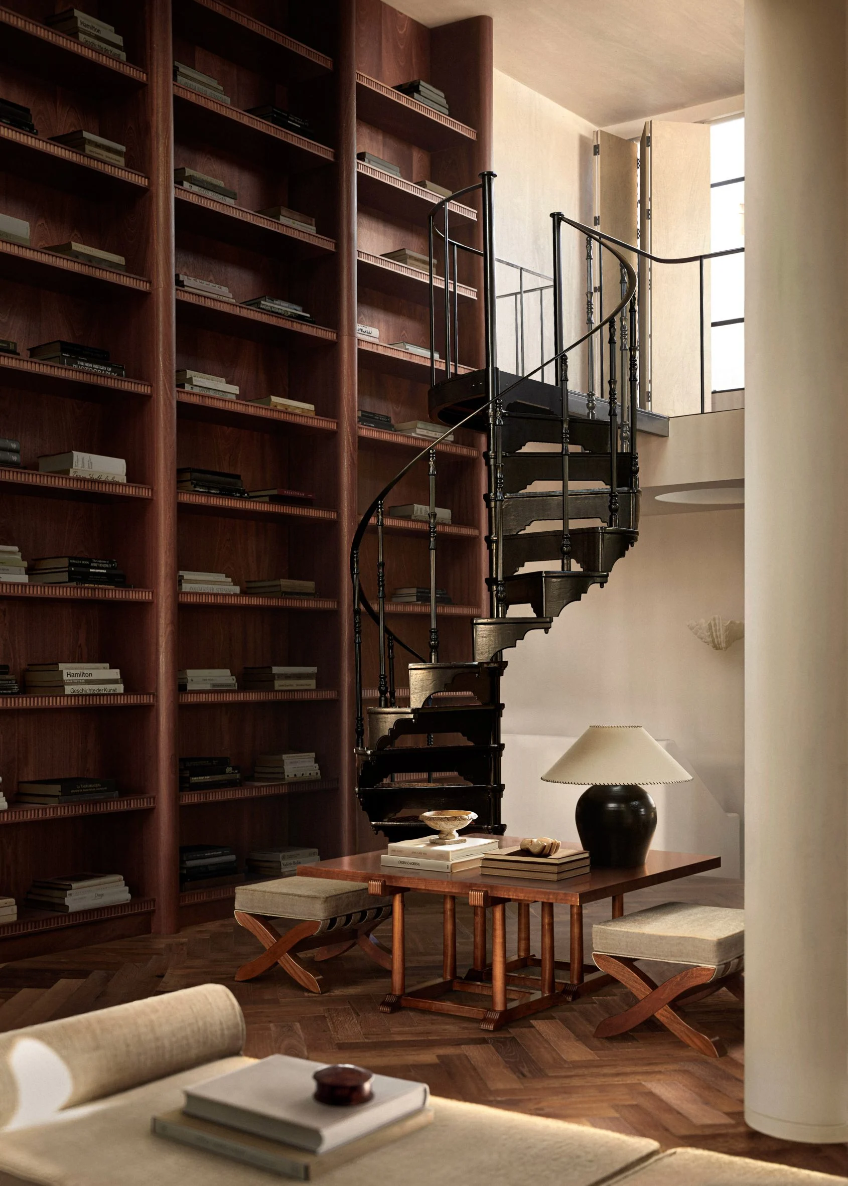 warm wood and a double-height library define timelessness in a ...