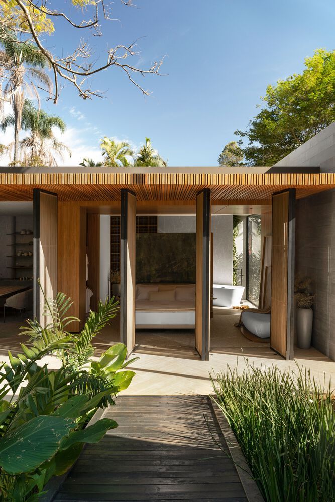 brazilian sui house synchronizes manmade architecture and natural ...