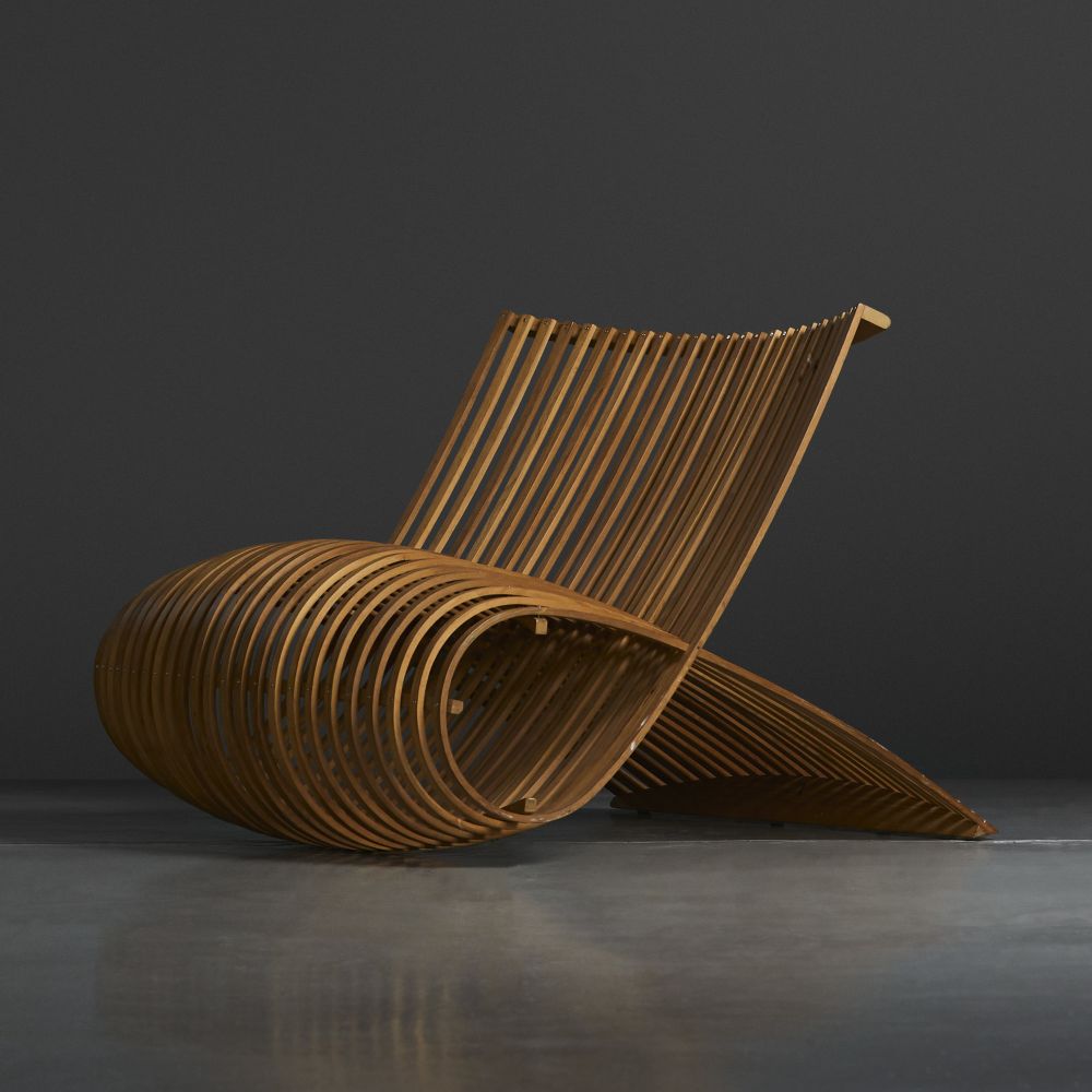 news: 8 sculptural chairs entirely made of wood | the design story