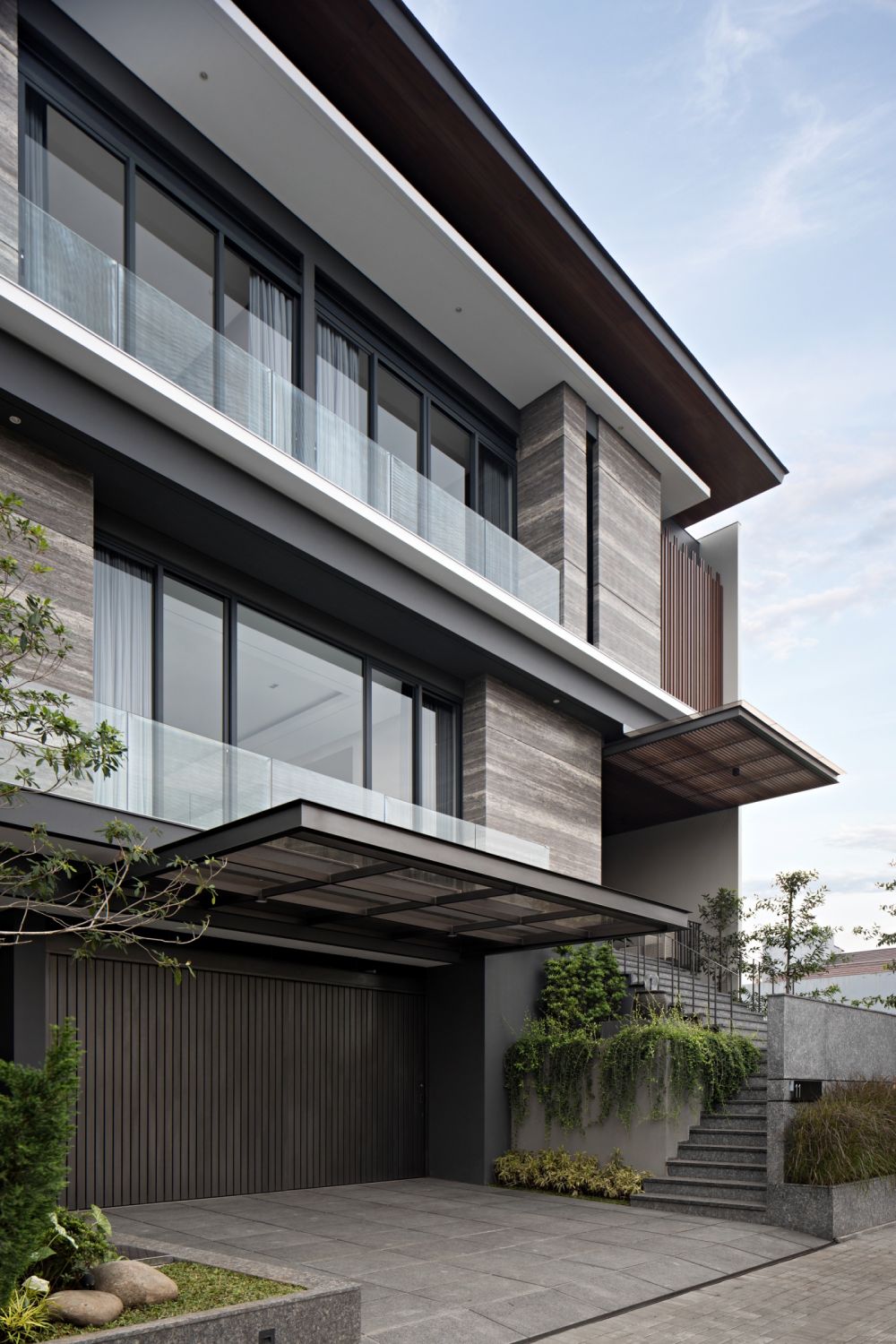 a modern and clean home design that imbues inevitable warmth in bandung ...