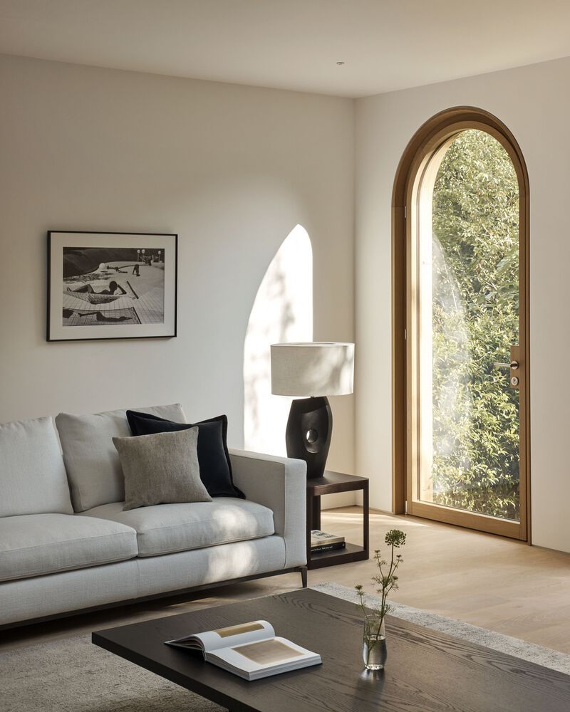 Brick Accents And Graceful Arches Define Timelessness At Laurie House Brick accents and graceful arches define timelessness at laurie house