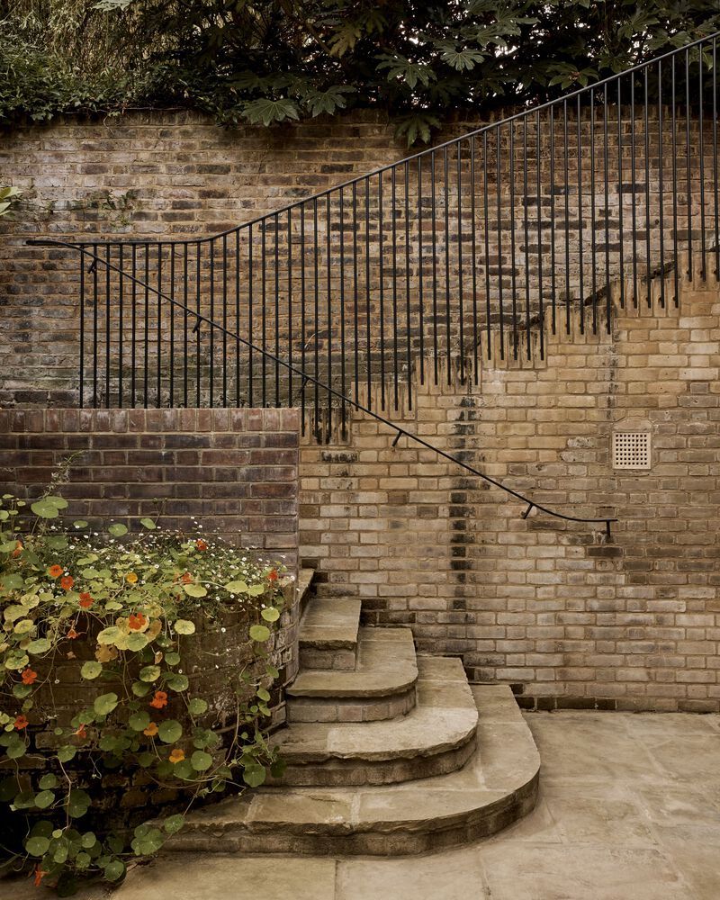 Brick Accents And Graceful Arches Define Timelessness At Laurie House Brick accents and graceful arches define timelessness at laurie house