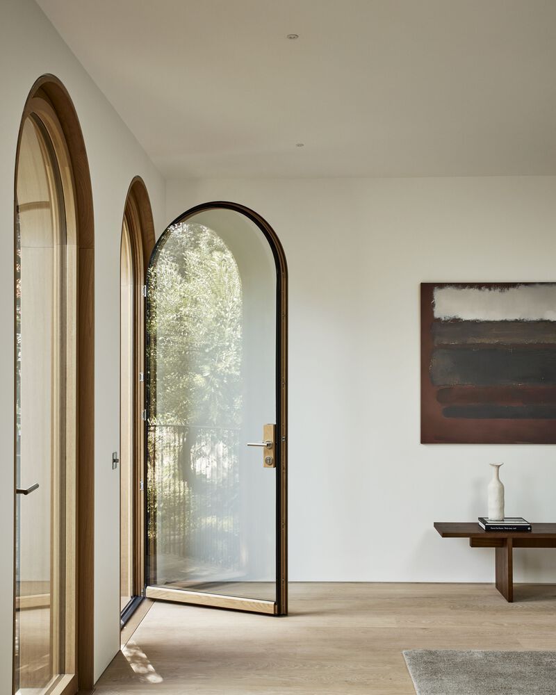 Brick Accents And Graceful Arches Define Timelessness At Laurie House Brick accents and graceful arches define timelessness at laurie house