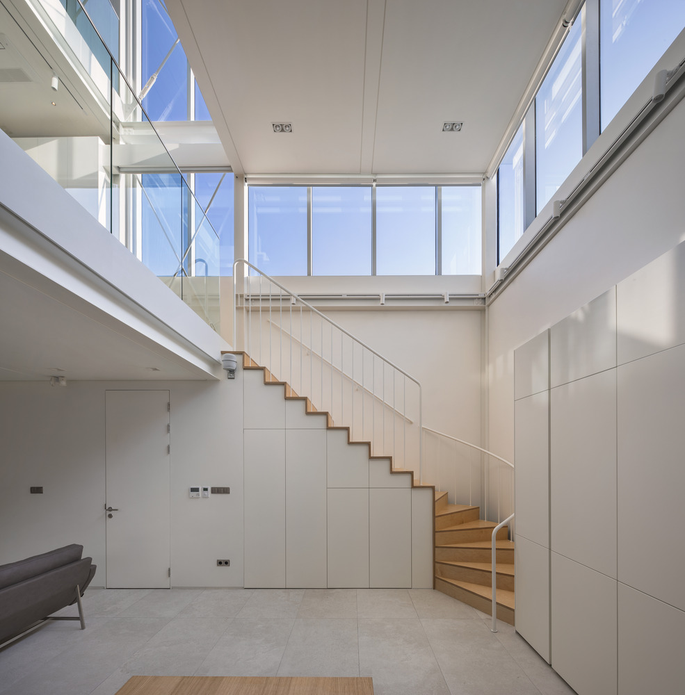 light hollow is a tranquil house that brings in abundant natural light ...