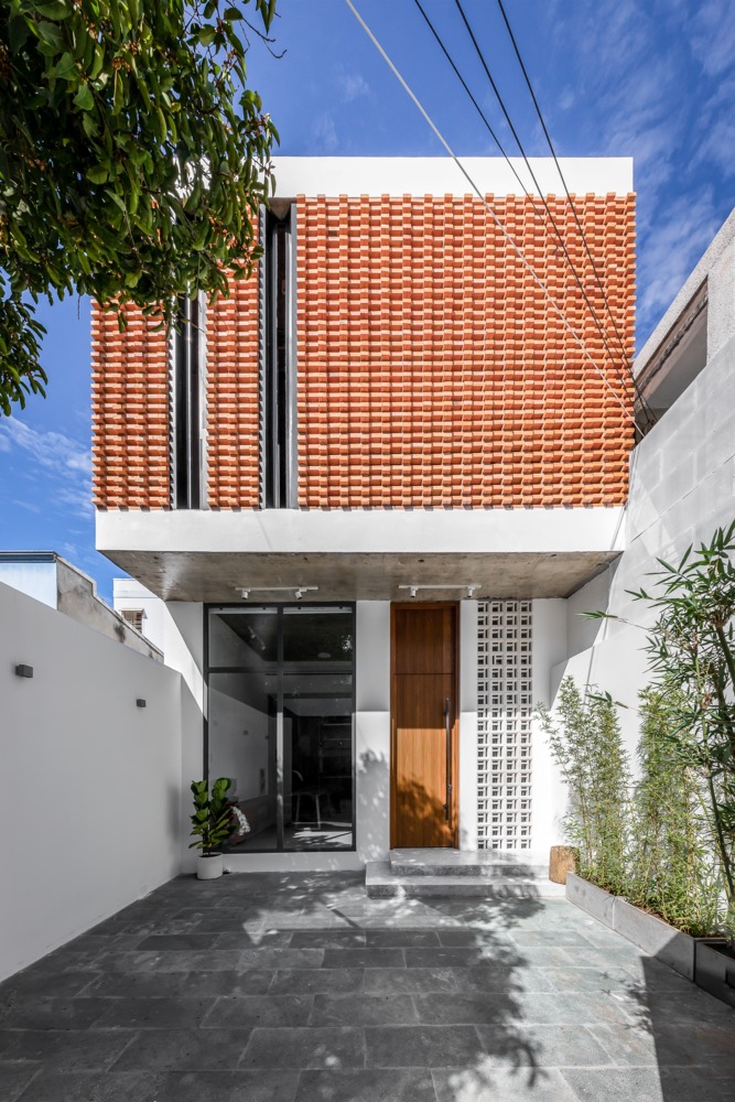 5 modern vietnamese house designs that put a twist on red bricks | the ...