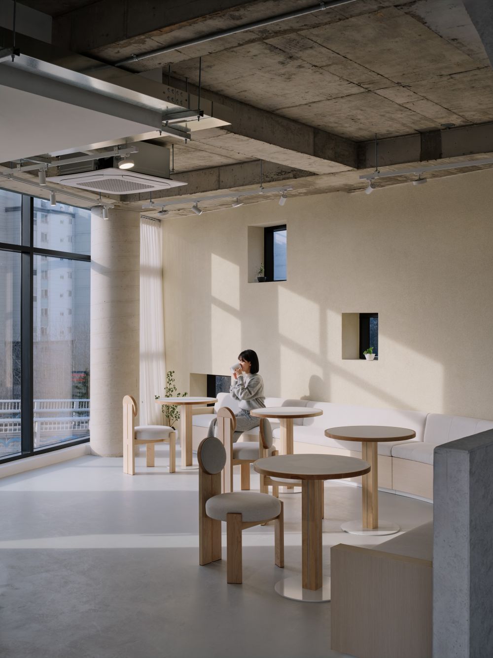 news: kkol studio infuses scandinavian minimalism into korean ozbe cafe ...