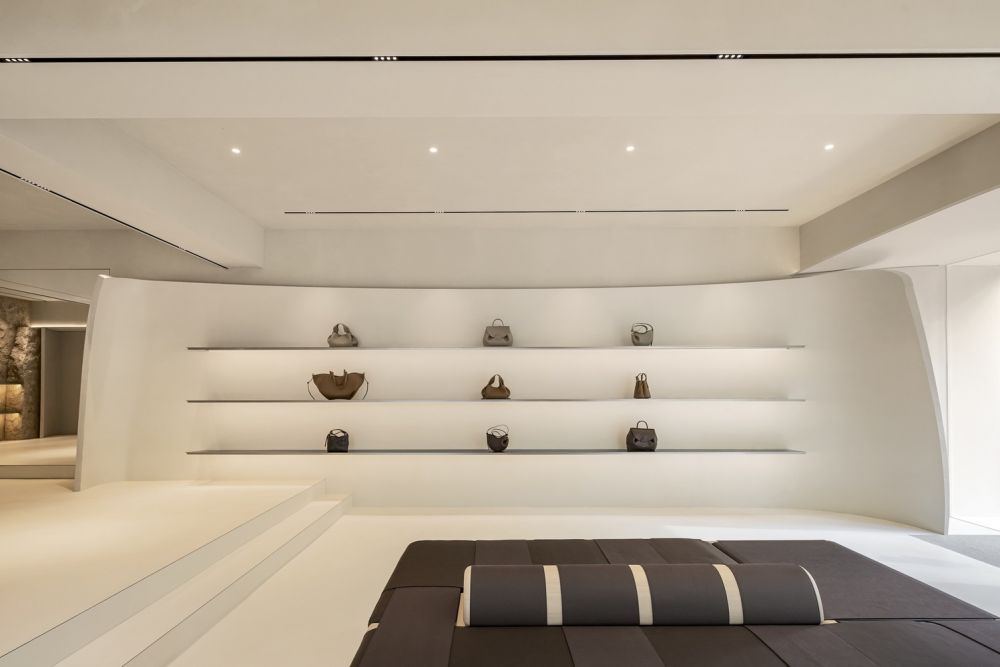 curved and fluid interiors redefine minimalism at polène paris seoul ...
