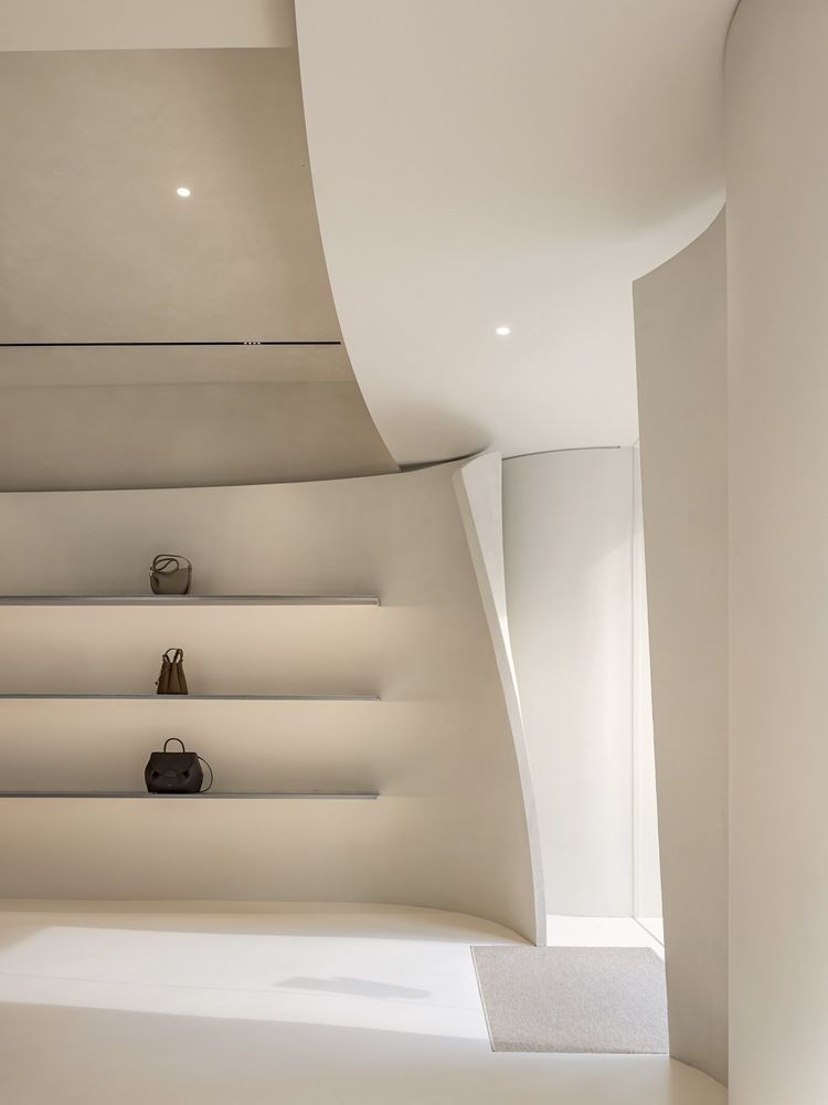 curved and fluid interiors redefine minimalism at polène paris seoul ...