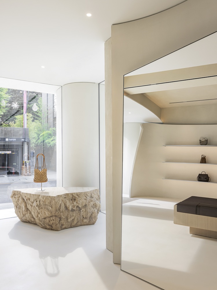 curved and fluid interiors redefine minimalism at polène paris seoul ...