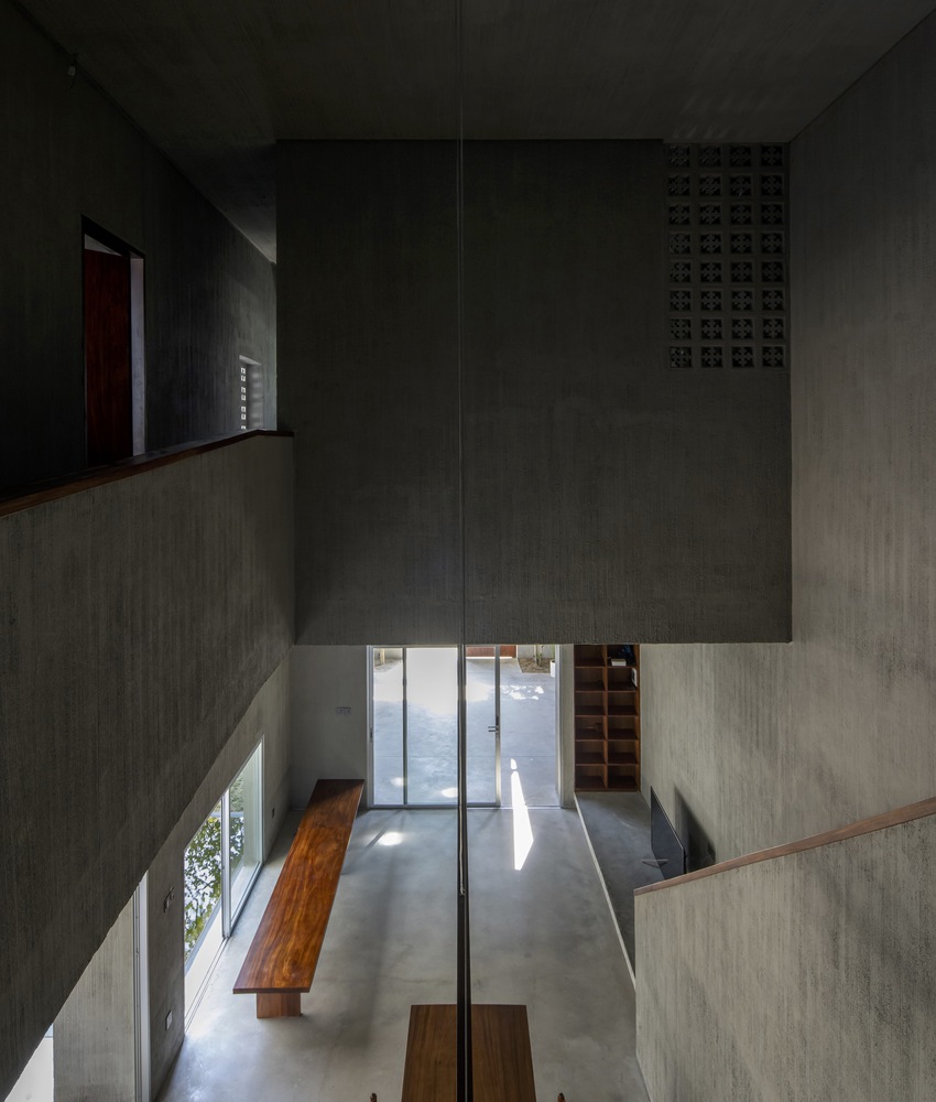 nha huong house is a concrete sanctuary that bridges modernity and ...