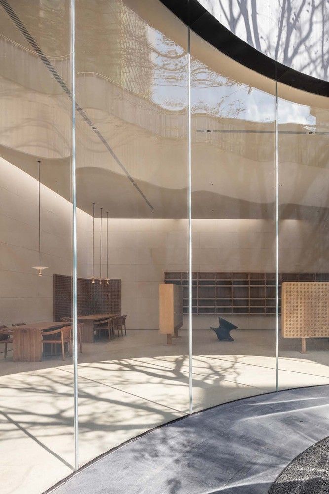 Louis Vuitton's flagship Osaka store covered in curving glass sails