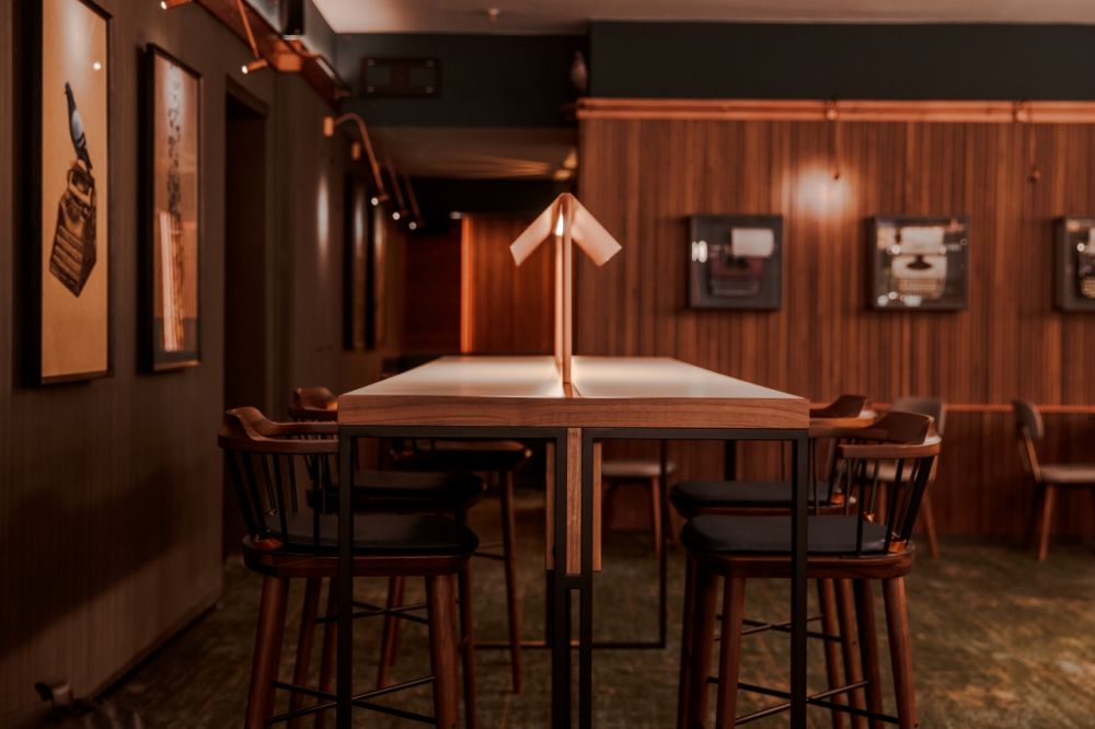 inside a retroinspired pigeon postbar & eatery at hilton cologne